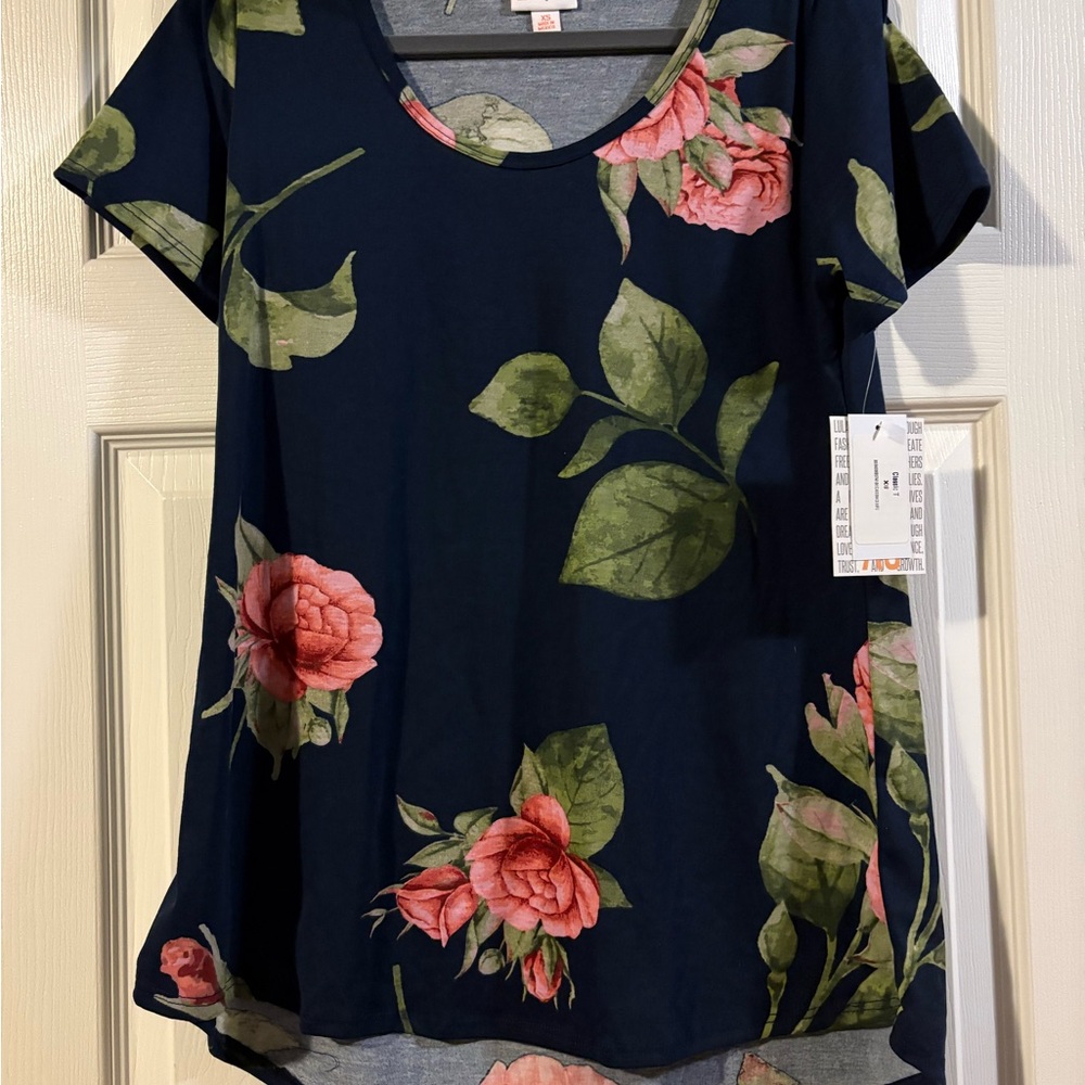 LuLaRoe Dark Blue Top with Pink Floral Design